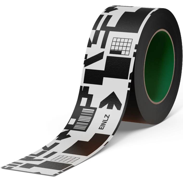 EINLZ Brand Tape als taktiles Markenobjekt vor dunklem Hintergrund